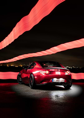 Red Mazda MX-5 with Light Trails