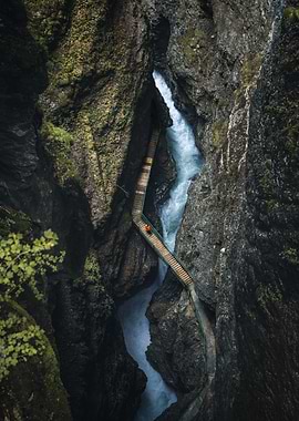 Person on a boardwalk in a gorge