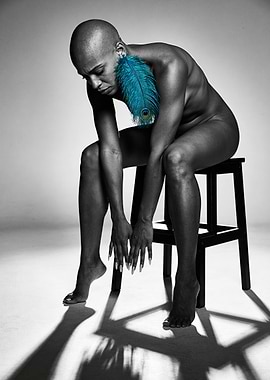 Bald Woman with Peacock Feather