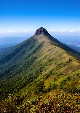 Majestic Mountain Peak Under Blue Sky