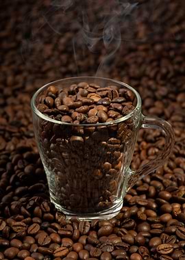 Steaming Coffee Beans in a Glass Cup