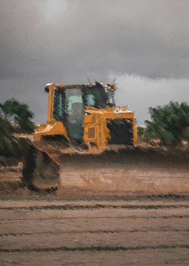 Yellow bulldozer grading dirt