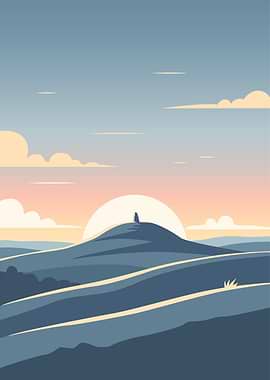 Sunrise over rolling hills with monolith