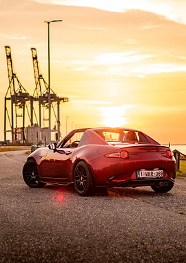 Red Mazda MX-5 at Sunset