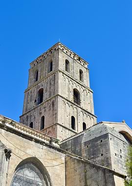 Ancient Stone Bell Tower Under Blue Sky