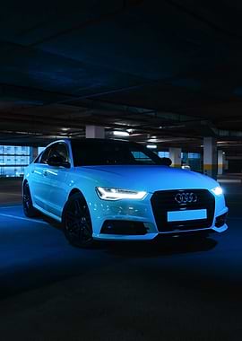 White Audi Sedan in Blue Light