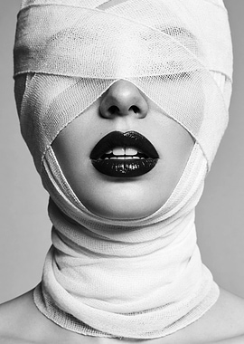 Woman with Bandaged Face and Dark Lipstick