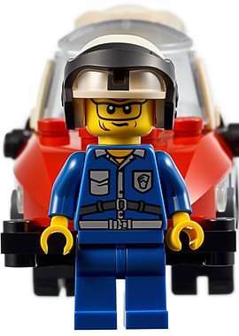 Lego minifigure in front of a car