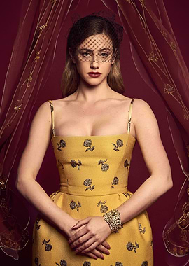 Lili Reinhart in yellow floral dress and veil