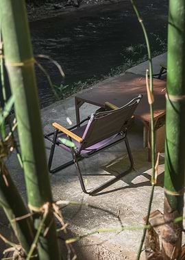 Outdoor seating by a stream