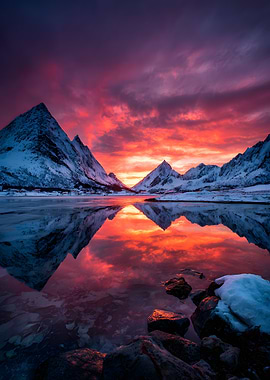 Dramatic Sunset Over Snowy Mountains