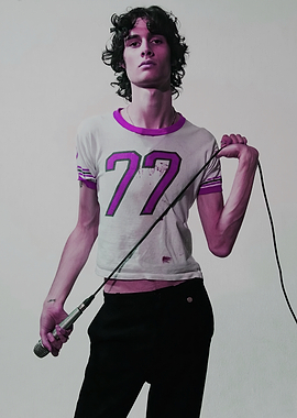 Man with Microphone and '77' Shirt