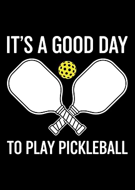 It's a Good Day to Play Pickleball crossed paddles and simple ball graphic
