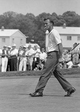 Golfer Arnold Palmer with a cigarette