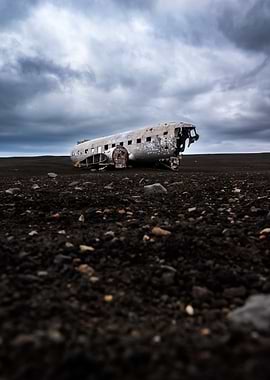 Wrecked Airplane on a Black Sand Beach