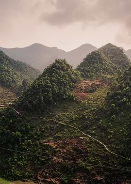 Misty Mountain Landscape with Green Hills