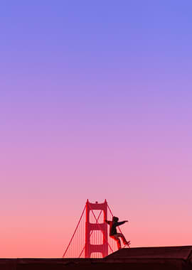 Skateboarder at Golden Gate Bridge Sunset