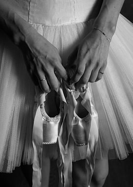 Ballerina Holding Pointe Shoes
