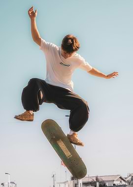 Skateboarder performing a jump trick
