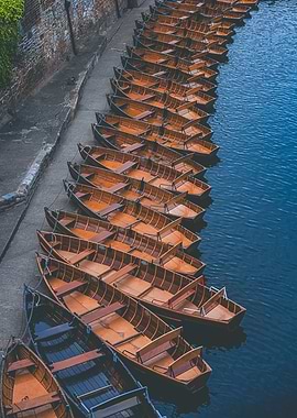 Rowboats docked on a canal