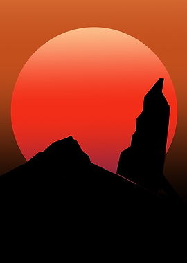 Sunset over silhouetted mountains
