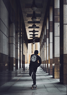 Skateboarder in Urban Corridor