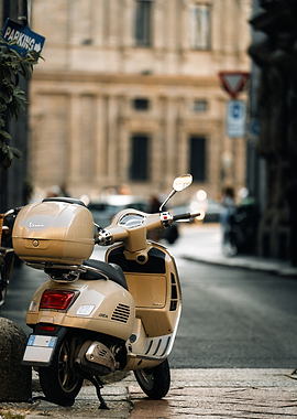 Beige Vespa Scooter on Cobblestone Street