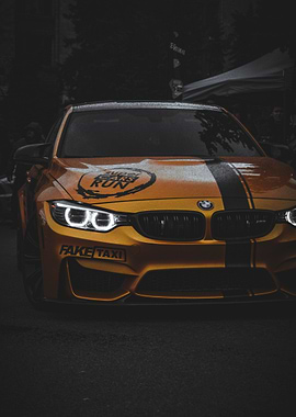 Yellow BMW M4 with Racing Decals