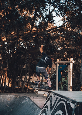 Skateboarder performing a trick in a skatepark