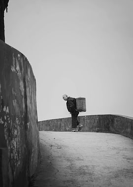 Elderly Person Carrying Basket