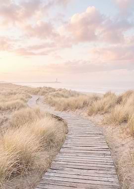 Wooden Path Through Dunes to Lighthouse