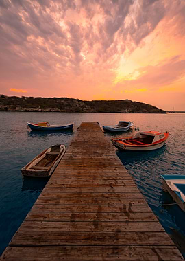 Boats at Sunset on a Wooden Dock Curacao