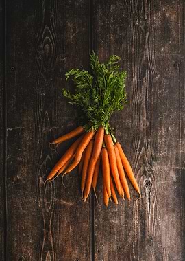 Fresh Carrots on Wooden Background
