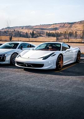 White Ferrari and Audi Sports Cars