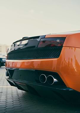 Rear View of an Orange Lamborghini