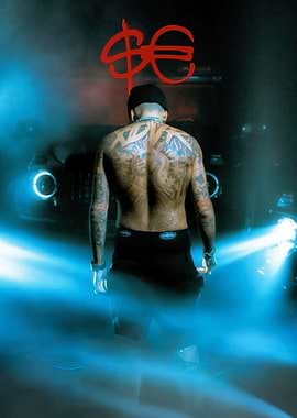 Man with Tattoos and Red Symbol