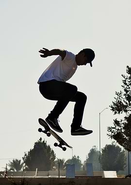 Skateboarder performing a jump trick