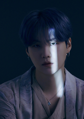 Suga of BTS in Dramatic Lighting