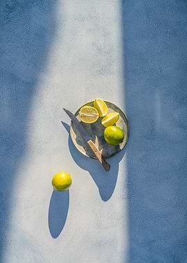 Limes on a Plate with Knife