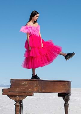 Olivia Rodrigo on a Piano