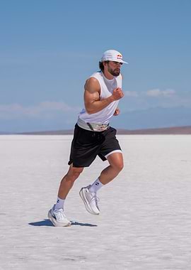 Athlete running on a salt flat