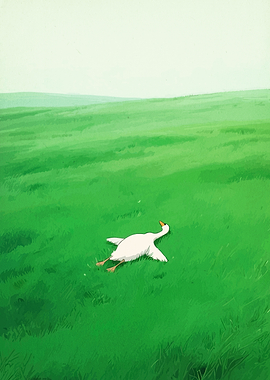 Goose lying in a green field