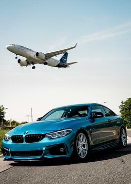 Blue BMW F32 and Lufthansa Airplane