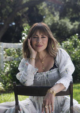 Woman in floral dress outdoors