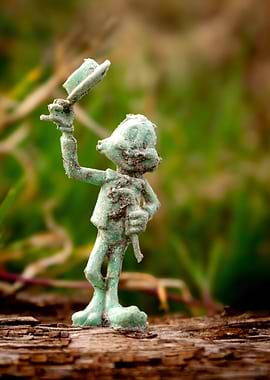 Vintage Toy Figure in Nature