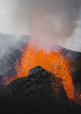 Volcanic eruption with lava and smoke
