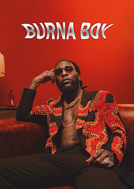 Burna Boy on Red Couch