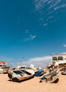 Boats on a Sandy Beach