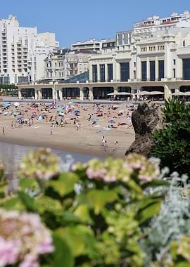Biarritz Crowded Beach with Buildings and Flowers