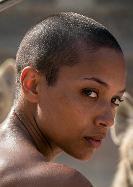 Close-up Portrait of a Woman with Buzz Cut